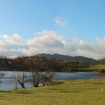 Loughrigg Tarn with Langdale Pikes behind, Lake District, mountains