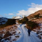 Chris Eley walking away from Langdale Pikes, Lake District, mountains