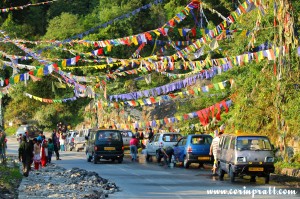 Flags, cars, people and car washing, Dussehra Hindu Festival, Gangtok, Sikkim, India