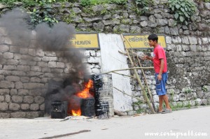 Man and fire, Sikkim, India