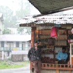 Stall owners in the rain, Yuksom, Sikkim, India